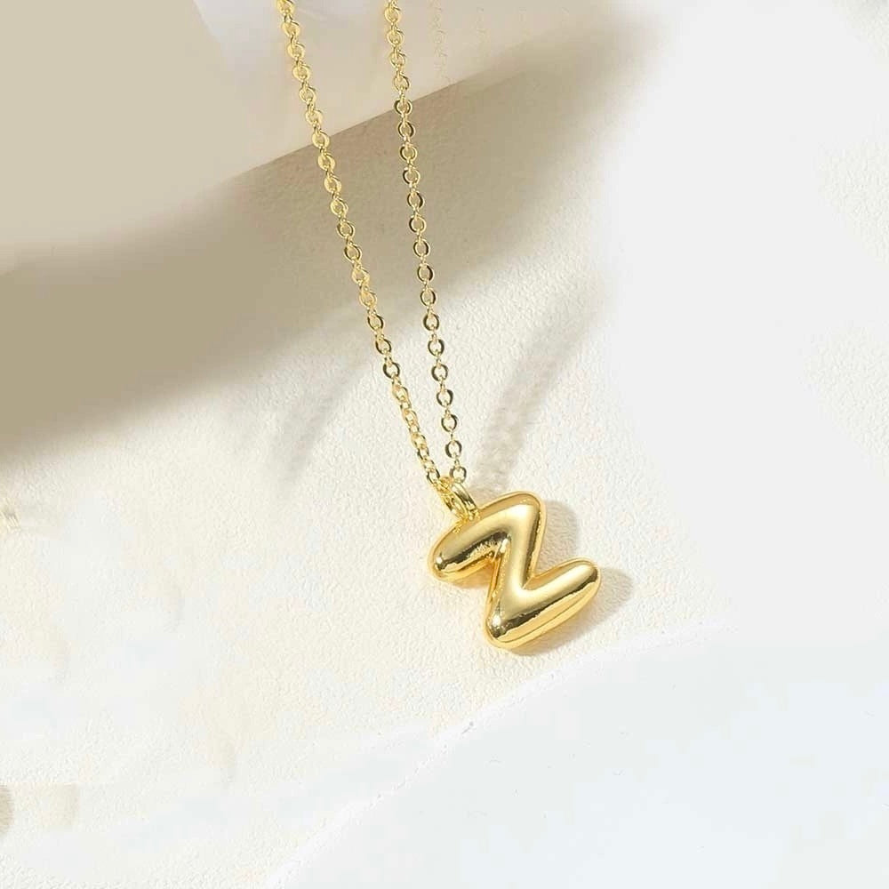 COLLAR INICIAL GLOBO