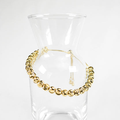PULSERA VIOLETA DORADA