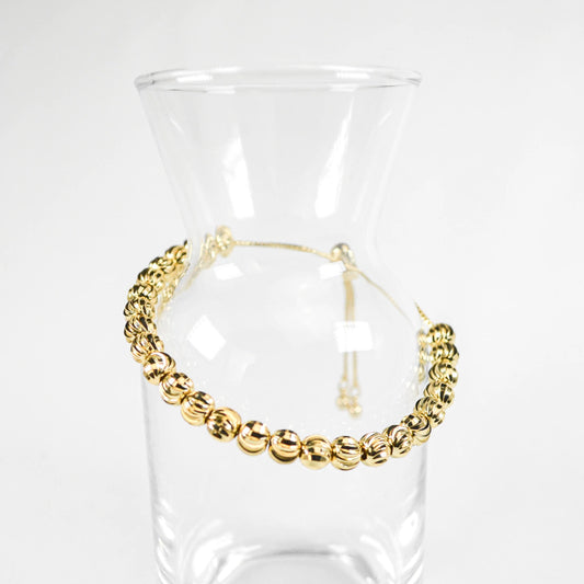 PULSERA VIOLETA DORADA