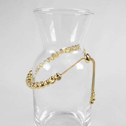 PULSERA VIOLETA DORADA